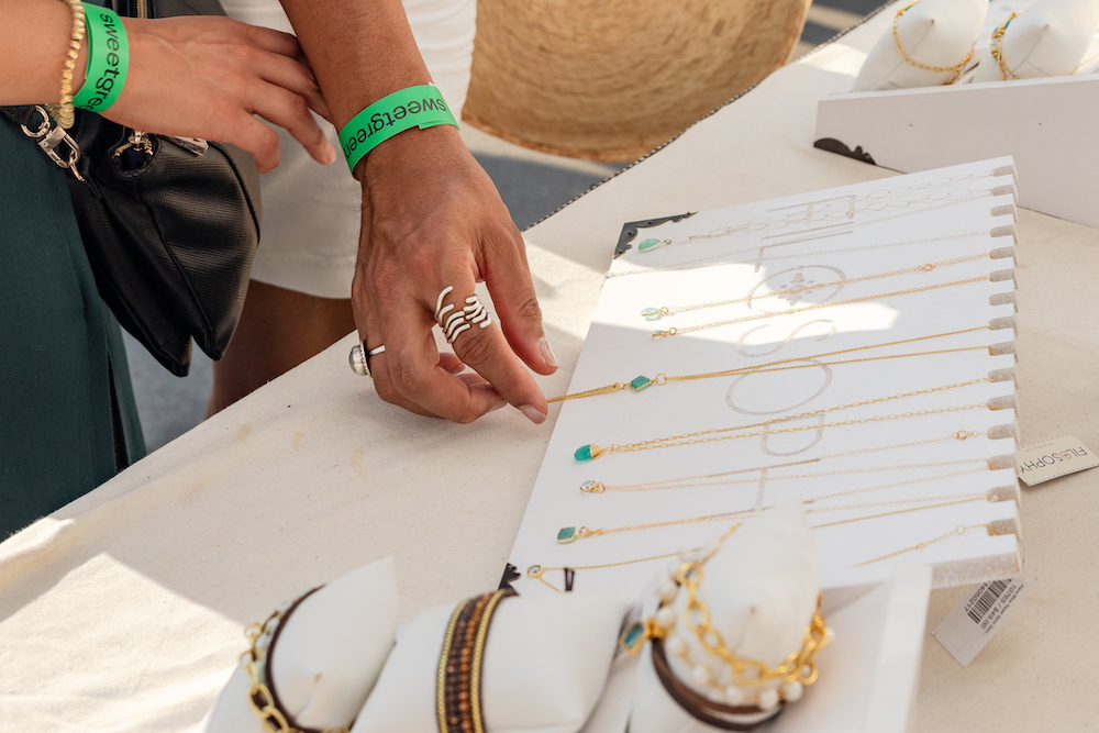 Shopping at Tennyson Street Fair includes handmade jewelry from local artists.